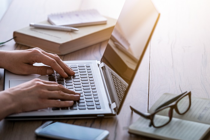 typing on a keyboard