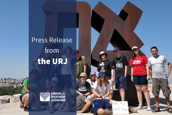 URJ Press Release - photo of group of Heller High students in front of AHAVA sculpture in Israel