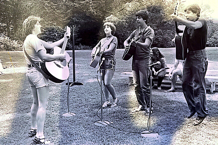 old photo of Camp Eisner campers playing music