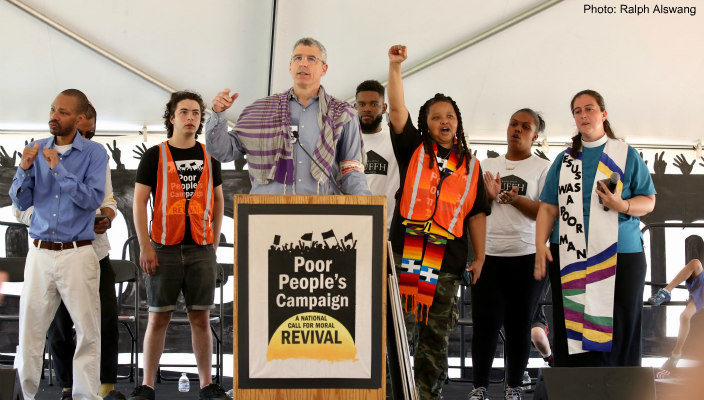Rabbi Rick Jacobs on a Poor Peoples Campaign podium with other activists and speakers at the recent rally
