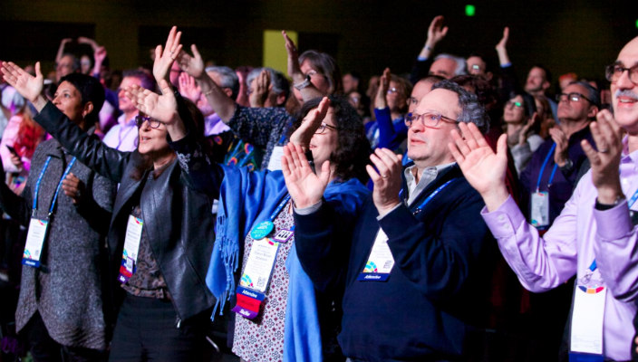 People clapping and smiling at the last URJ Biennial