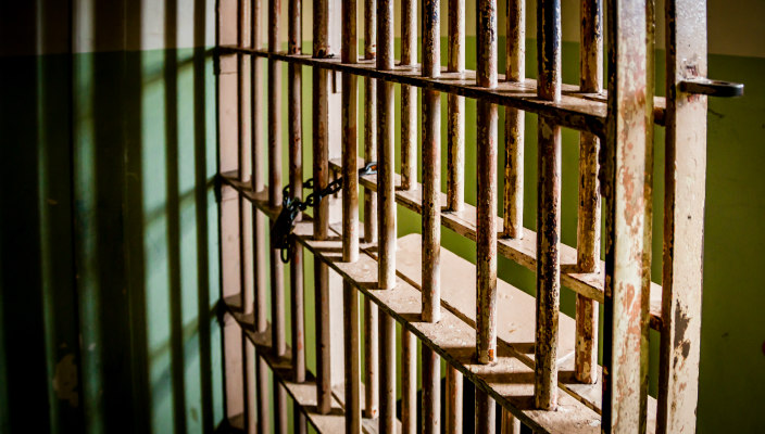 Closeup of rusted prison cell bars