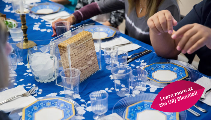 View of seder table and people celebrating