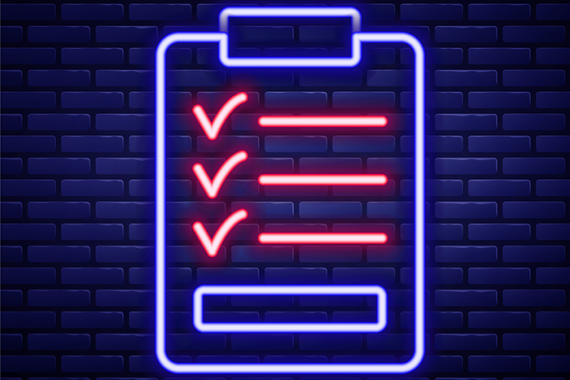 Photo of a glowing neon clipboard sign