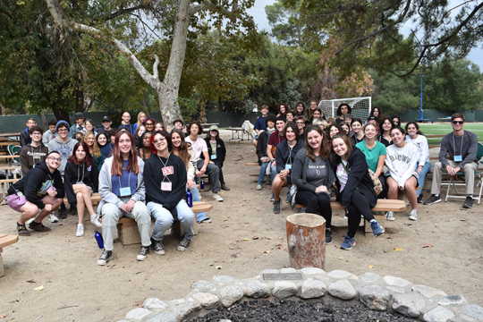 group of teenagers posing for a picture