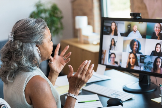 Businesswoman gestures during video conference