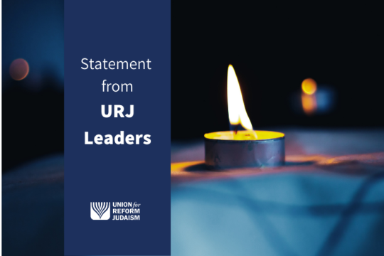 memorial candle with the logo of the Union for Reform Judaism and the words A statement from URJ Leaders