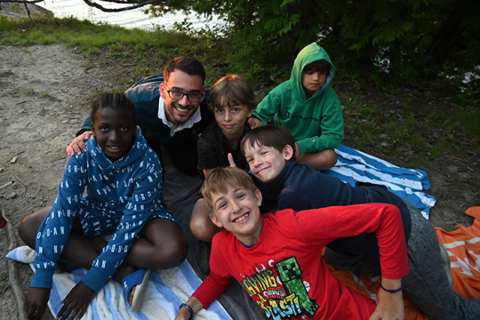 Photo of people of different backgrounds at camp
