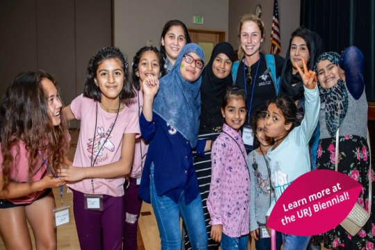 Group of smiling Jewish and Muslim children together at Camp Nefesh