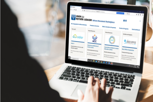 Closeup of the new Reform Movement Marketplace website on a laptop screen