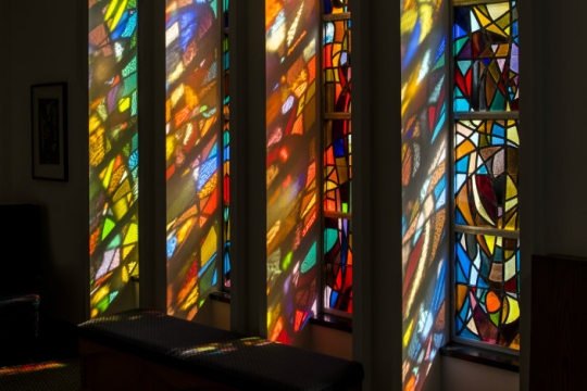 Close up of a stained glass window inside a synagogue