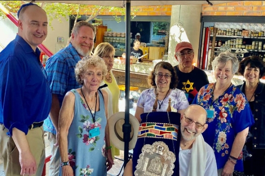 Members of the Maryland congregation and the Mexican congregation with the Torah being donated