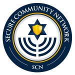 Photo of the SCN logo; says Secure Community Network in white, on a blue circle, with a blue star of david with a yellow shield inside of it and a blue menurah underneath